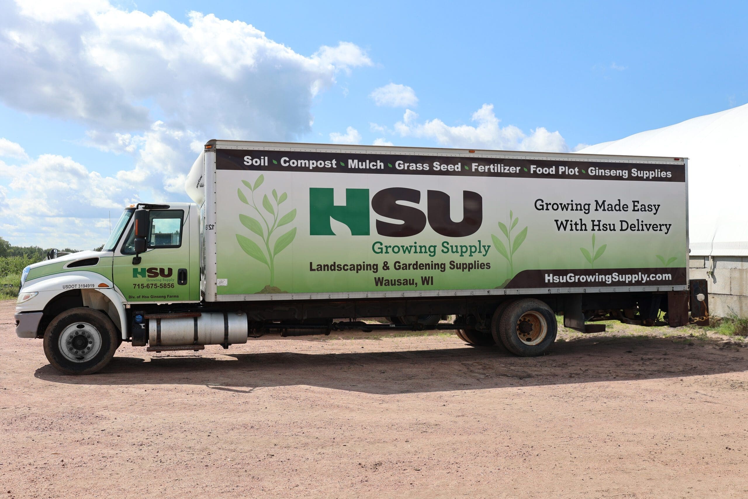Hsu Growing Supply truck delivering compost and picking up materials for recycling
