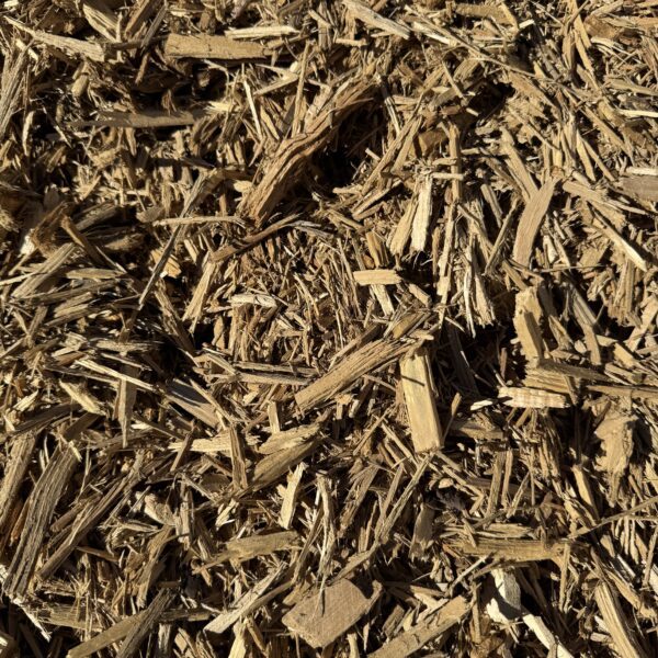 Close-up of HSU Growing Supply Amber colored mulch.