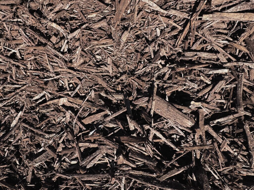 Close-up of HSU Growing Supply Black Cherry colored mulch.