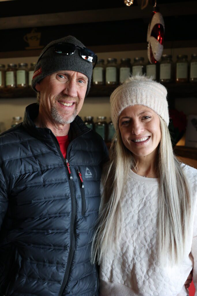 Two owners of Wild Roots Apothecary standing together
